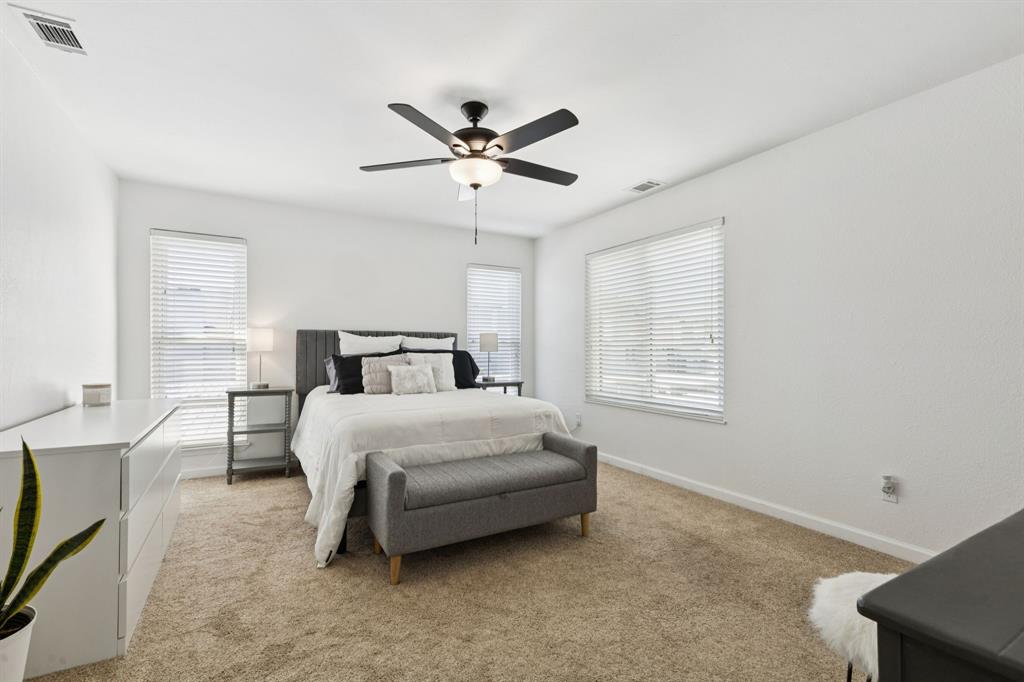 1641 Choteau Circle Grapevine, TX 76051 - Photo 17 of 29 a bedroom with a bed and window