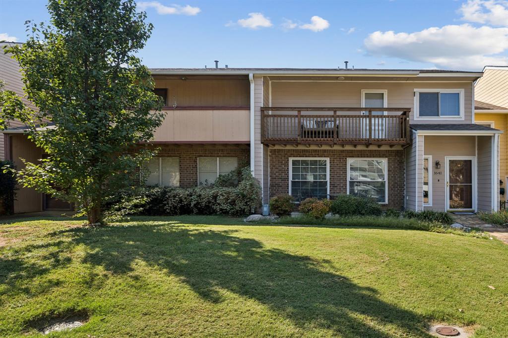 1641 Choteau Circle Grapevine, TX 76051 - Photo 29 of 29 a front view of a house with a yard