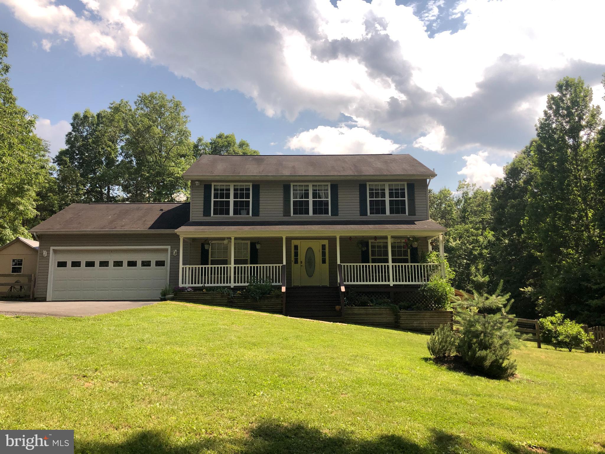 4575 Courtneys Corner Road Sumerduck, VA 22742 - Photo 3 of 145 Two ceiling fans on the rocking chair porch