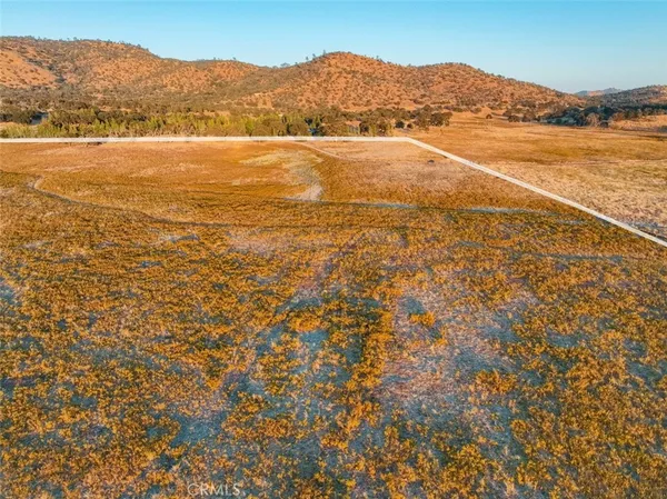 a view of an ocean and a mountain