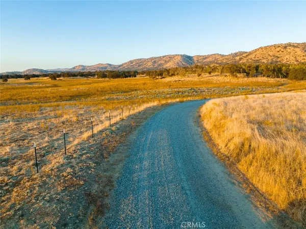 a view of an ocean and a mountain