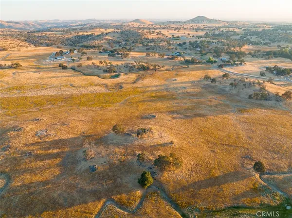 a view of an ocean and a mountain