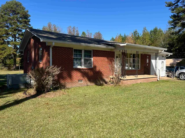 a view of a house with a patio