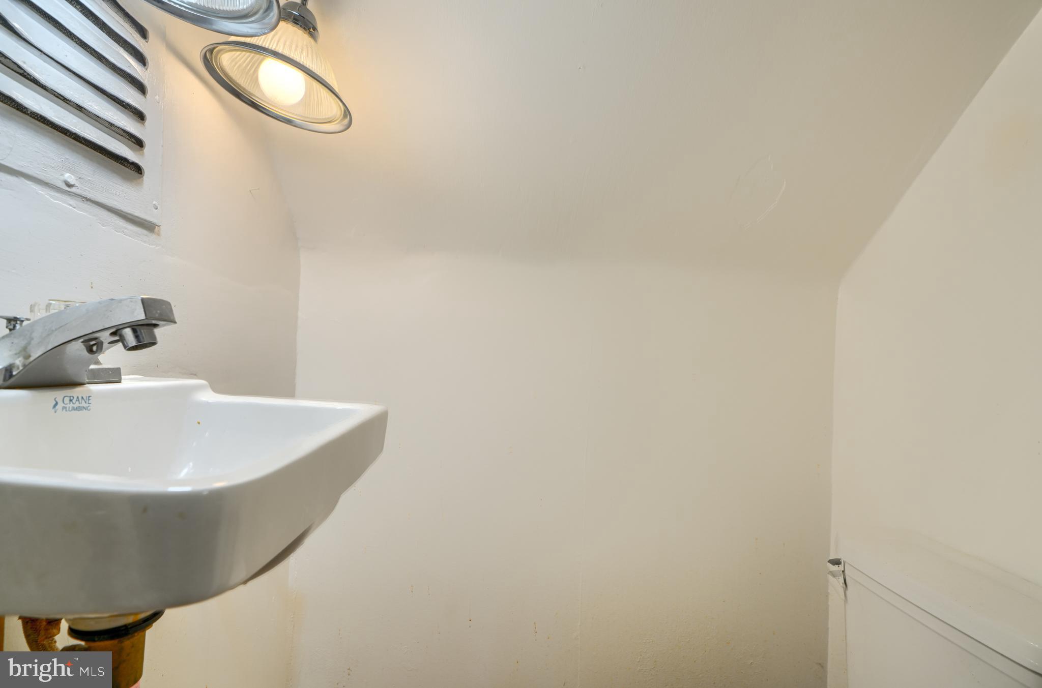 2215 Lodge Farm Road Baltimore, MD 21219 - Photo 26 of 38 Half Bath (upper level)