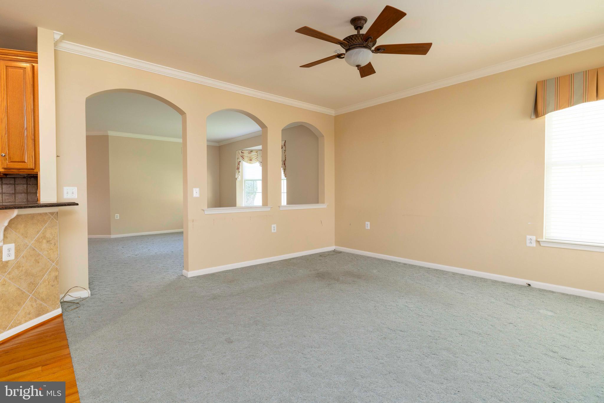1028 Conway Court Warminster, PA 18974 - Photo 12 of 32 an empty room with windows and fan