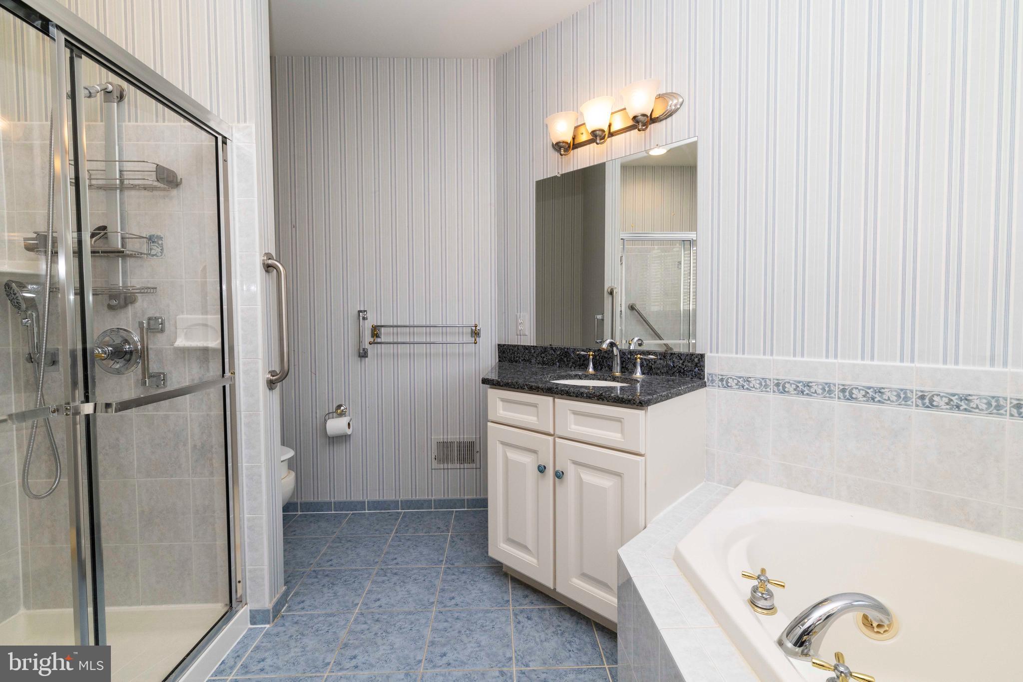 1028 Conway Court Warminster, PA 18974 - Photo 24 of 32 a bathroom with a tub sink and mirror
