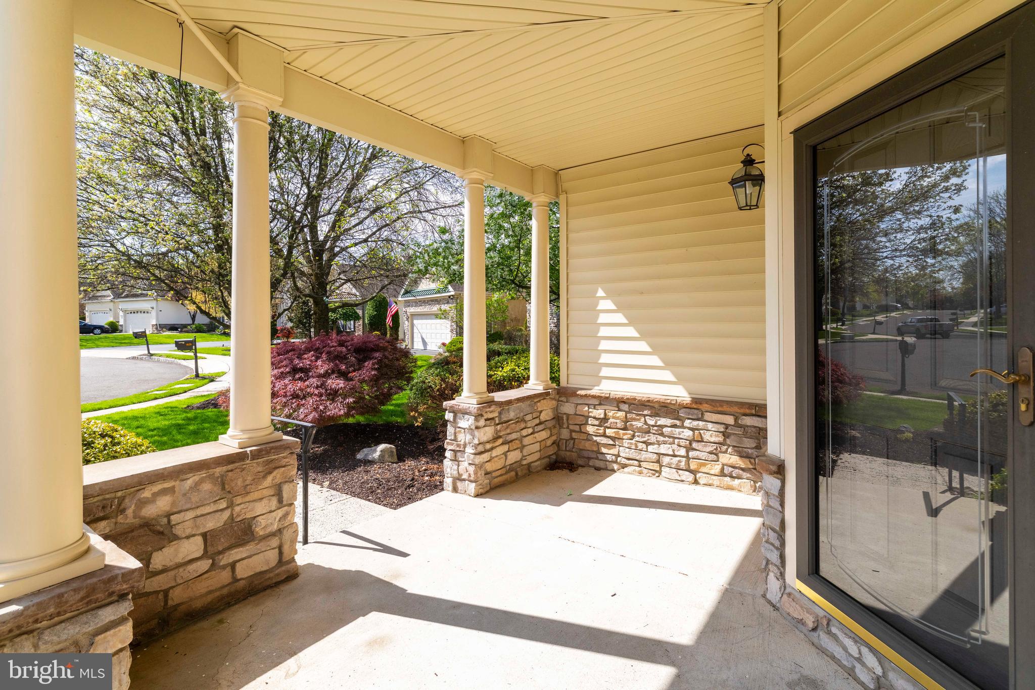 1028 Conway Court Warminster, PA 18974 - Photo 3 of 32 a view of a porch with a bench