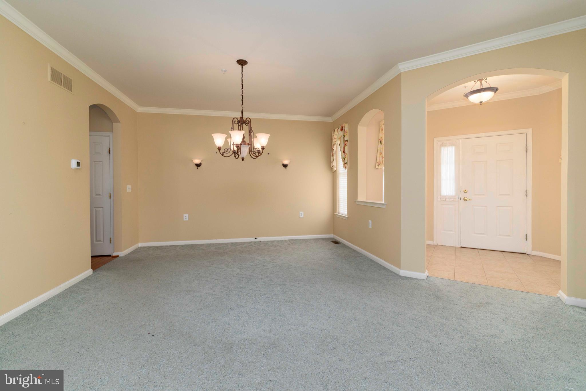 1028 Conway Court Warminster, PA 18974 - Photo 4 of 32 a view of a chandelier in an empty room