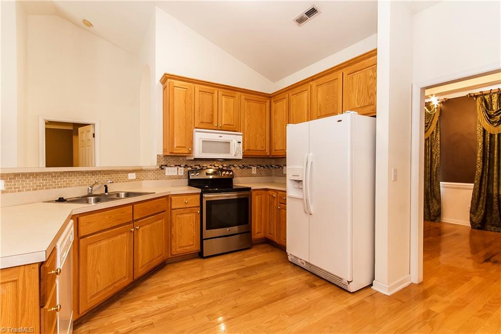 1757 Hanford Hills Road Graham, NC 27253 - Photo 9 of 24 Vaulted kitchen