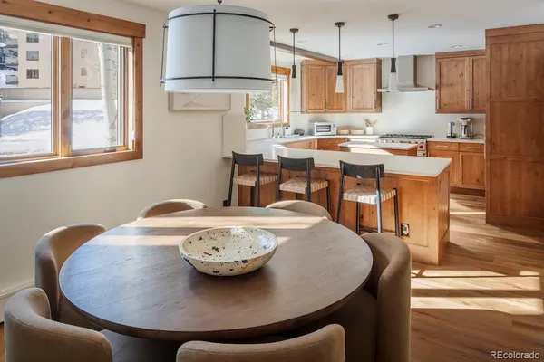 a view of a dining room with furniture