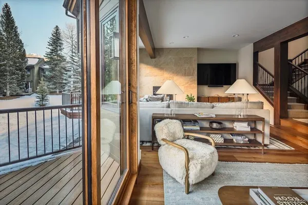 a room with furniture and a flat screen tv