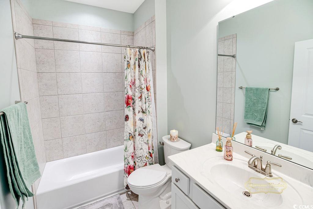 2110 Silver Spring Lane Myrtle Beach, SC 29577 - Photo 20 of 40 Bathroom with vanity and shower / tub combo with curtain