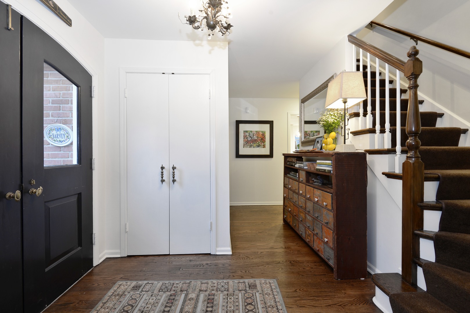 1034 Pontiac Road Wilmette, IL 60091 - Photo 2 of 32 a view of an entryway with wooden floor