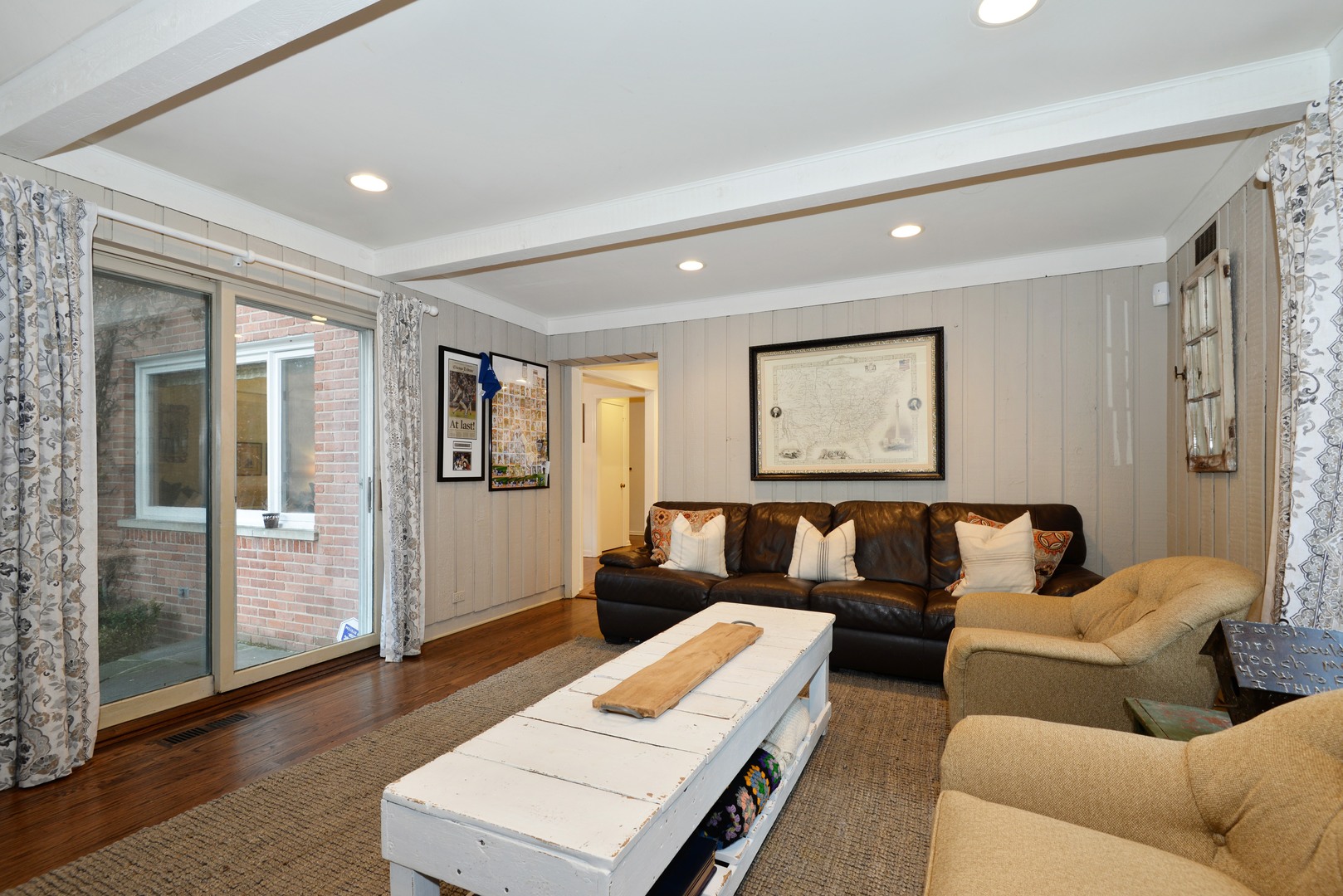 1034 Pontiac Road Wilmette, IL 60091 - Photo 12 of 32 a living room with furniture and wooden floor