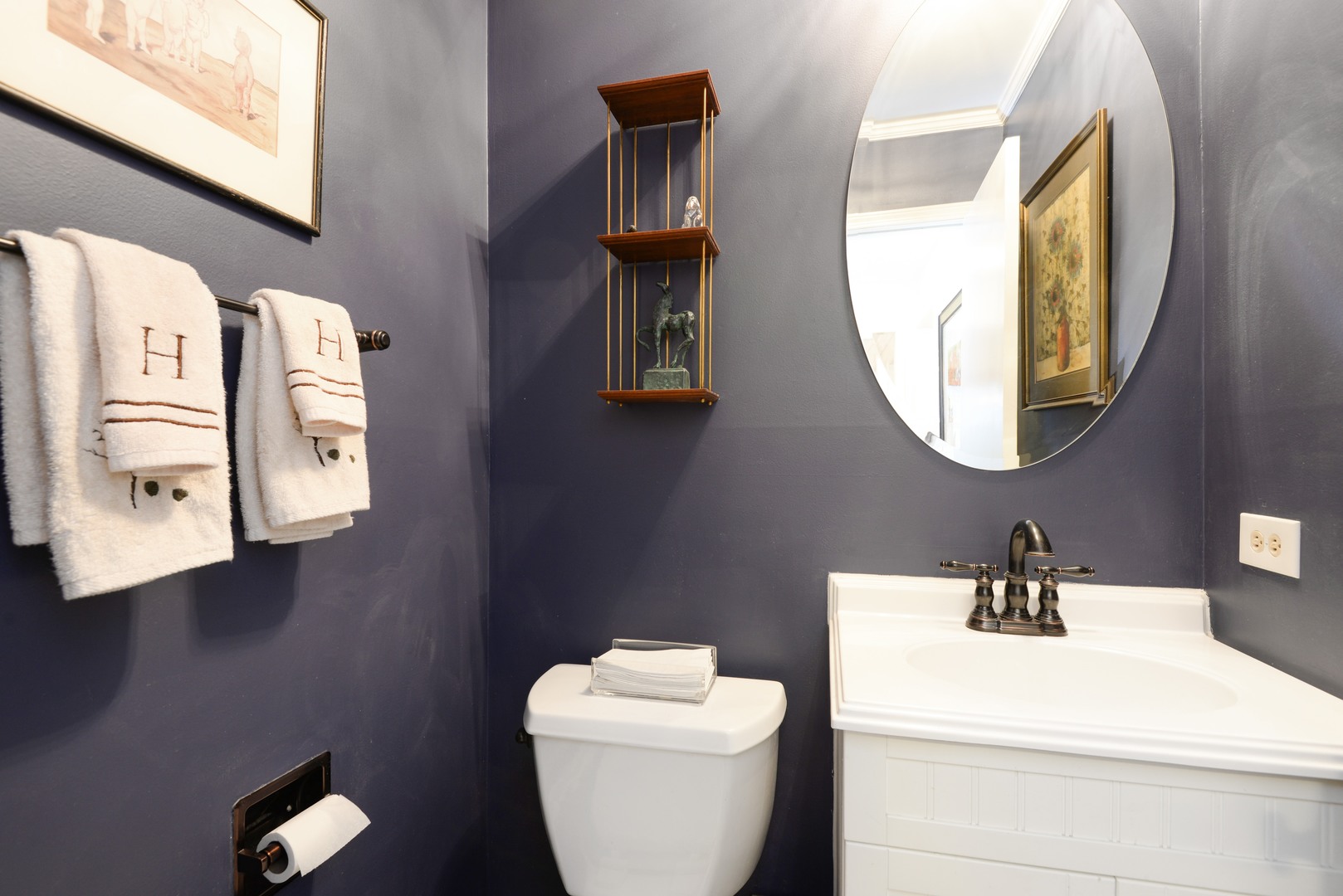 1034 Pontiac Road Wilmette, IL 60091 - Photo 13 of 32 a bathroom with a toilet and a sink