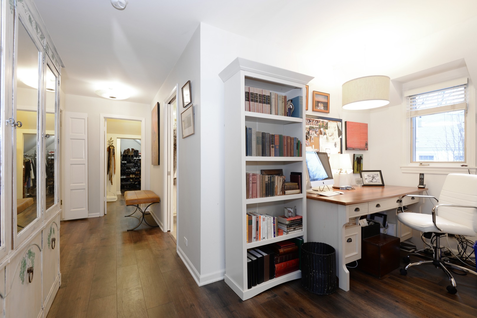 1034 Pontiac Road Wilmette, IL 60091 - Photo 16 of 32 a workspace with furniture bookshelf and a window