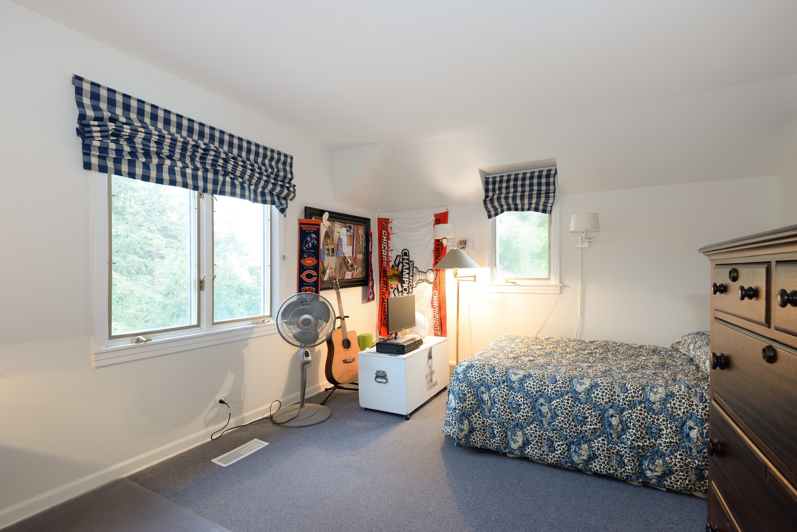 1034 Pontiac Road Wilmette, IL 60091 - Photo 22 of 32 a bedroom with a bed and wooden floor