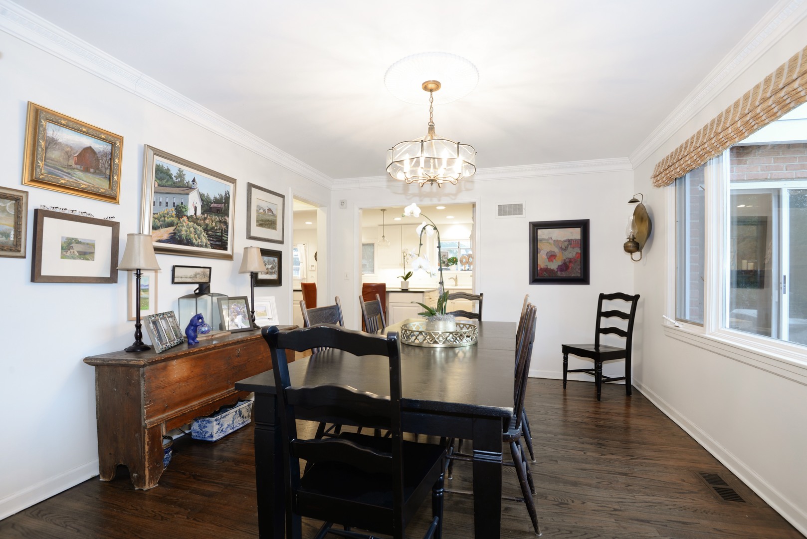 1034 Pontiac Road Wilmette, IL 60091 - Photo 7 of 32 a view of a dining room with furniture and wooden floor