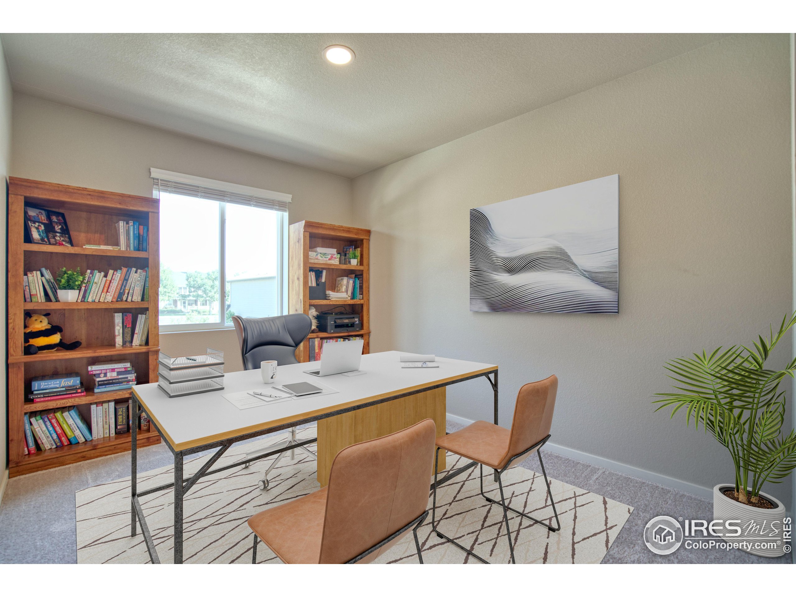 6615 4th St Road, Unit 2 Greeley, CO 80634 - Photo 14 of 31 a view of a workspace with furniture