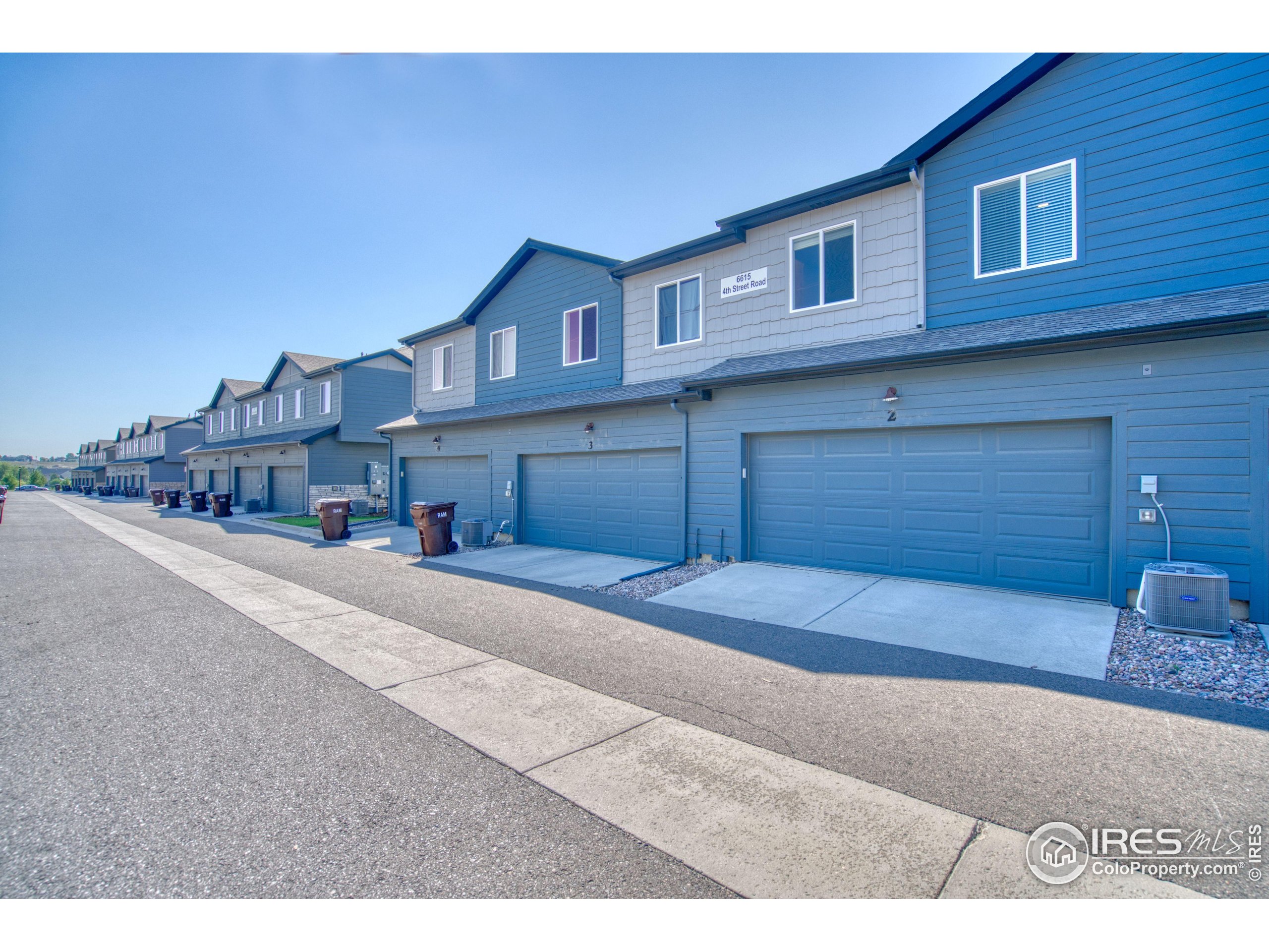 6615 4th St Road, Unit 2 Greeley, CO 80634 - Photo 23 of 31 a view of a house with a outdoor space