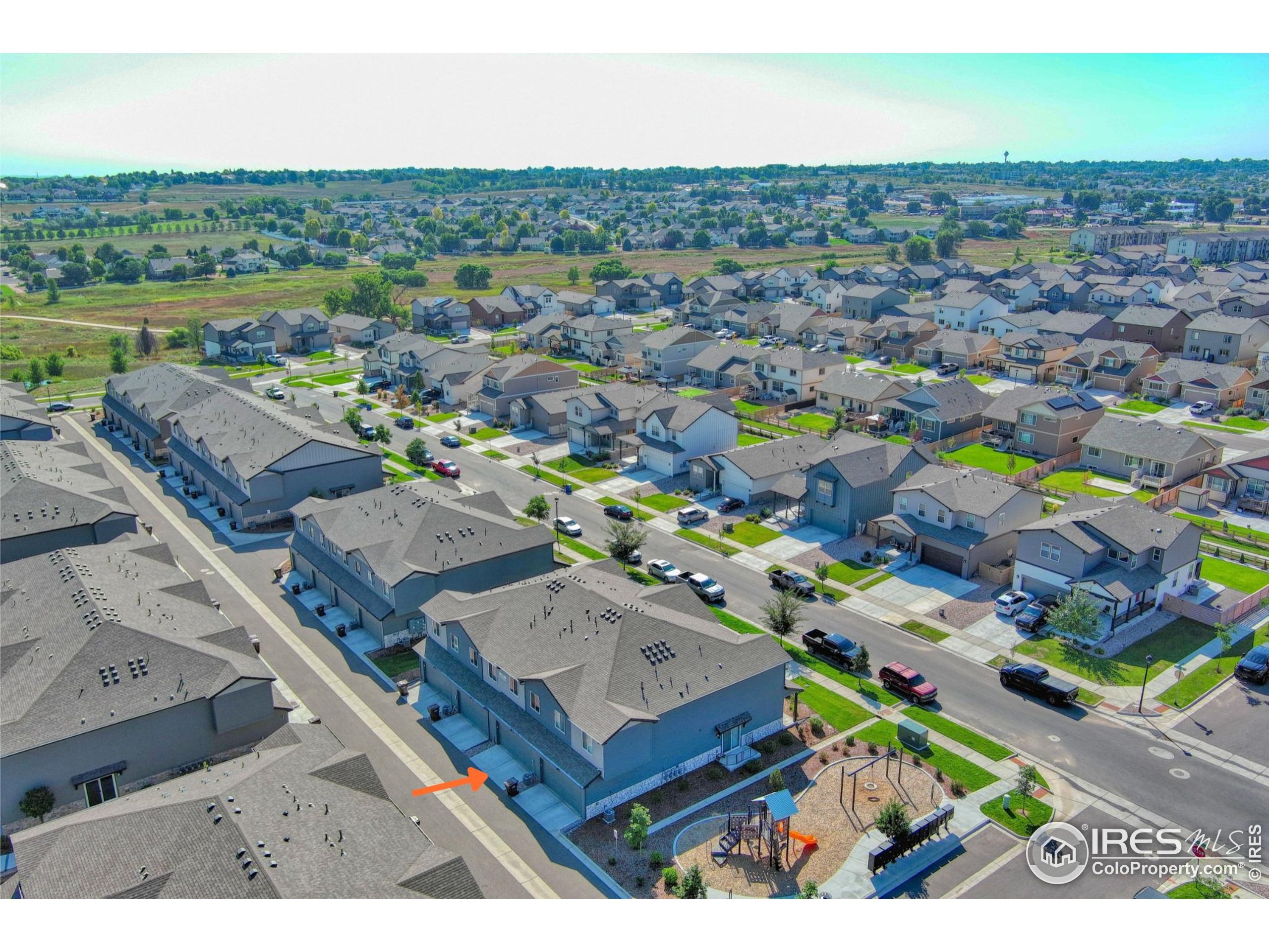 6615 4th St Road, Unit 2 Greeley, CO 80634 - Photo 26 of 31 an aerial view of a house with a garden