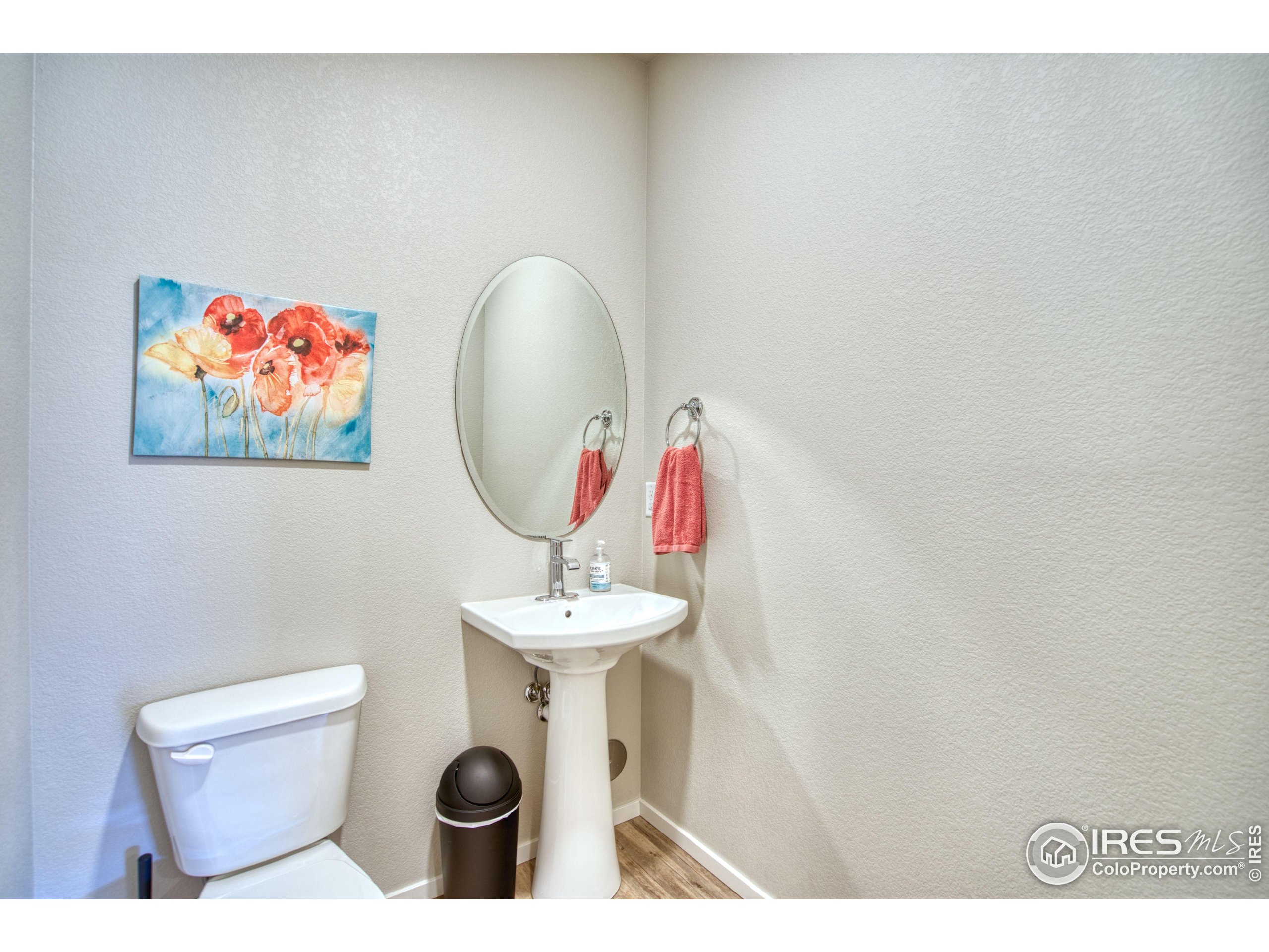6615 4th St Road, Unit 2 Greeley, CO 80634 - Photo 7 of 31 a bathroom with a toilet and a sink