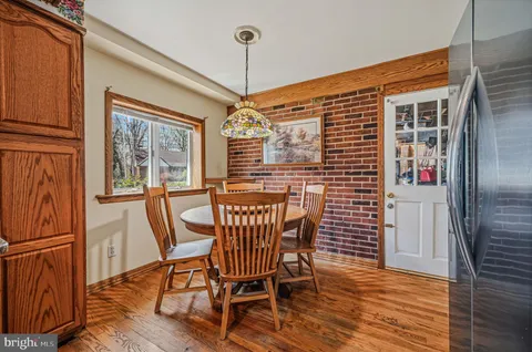 a patio with table and chairs