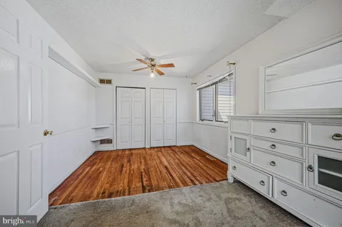 a bathroom with a sink a toilet and bathtub