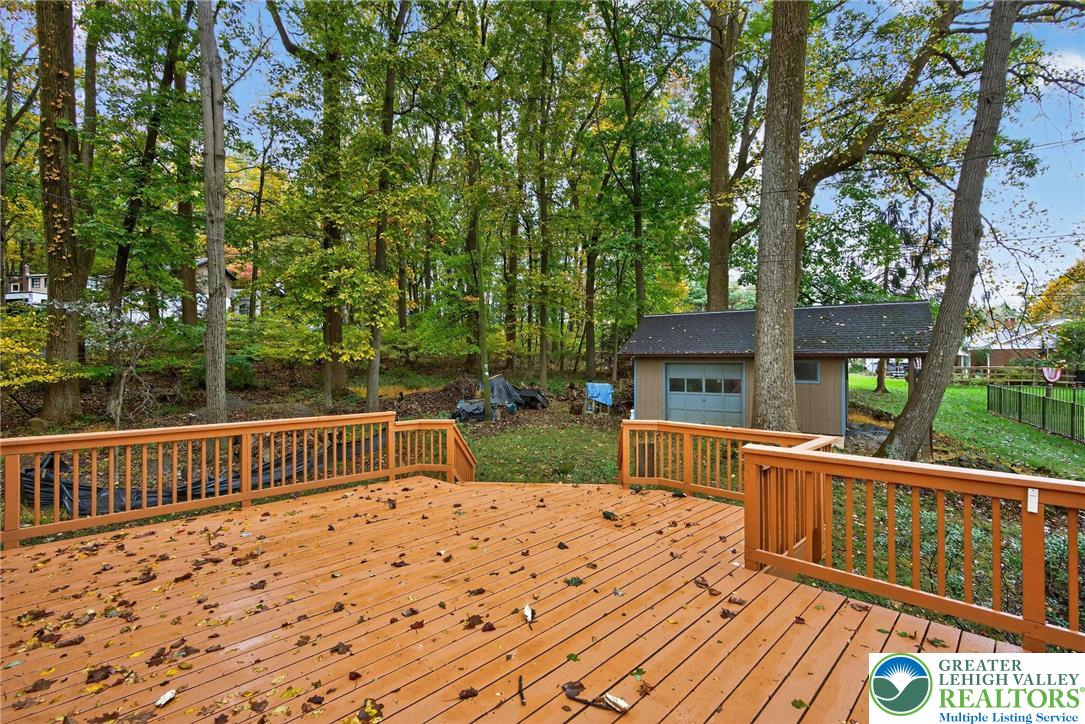 340 Chestnut Hill Road Emmaus, PA 18049 - Photo 14 of 49 a view of house with backyard and deck