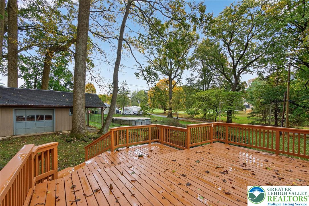 340 Chestnut Hill Road Emmaus, PA 18049 - Photo 15 of 49 a view of backyard with swimming pool and outdoor seating