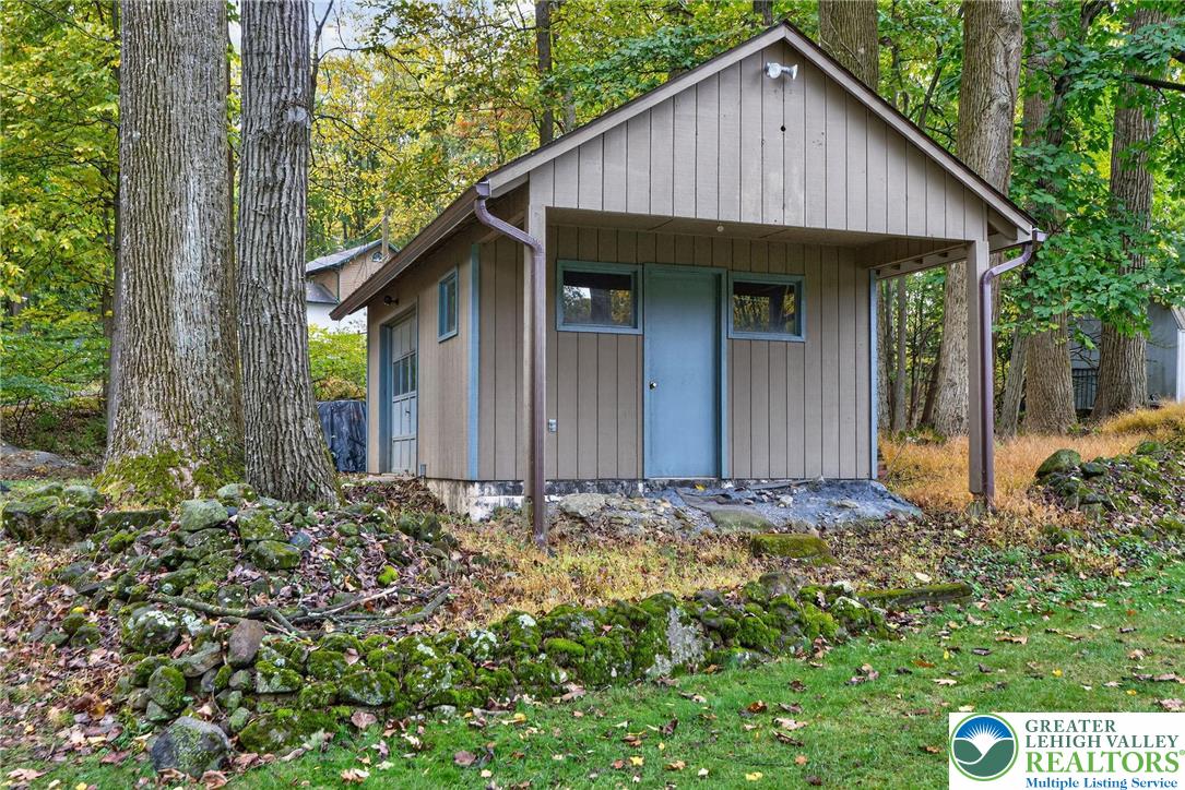 340 Chestnut Hill Road Emmaus, PA 18049 - Photo 17 of 49 a view of a house with a small yard