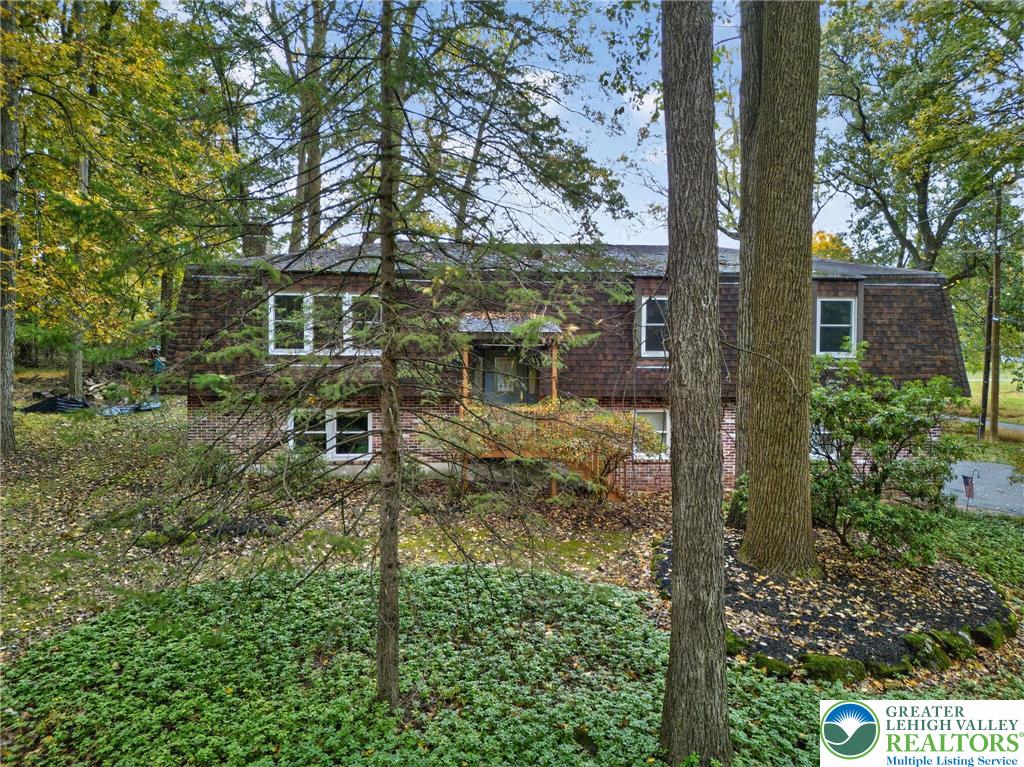 340 Chestnut Hill Road Emmaus, PA 18049 - Photo 2 of 49 a backyard of a house with lots of green space