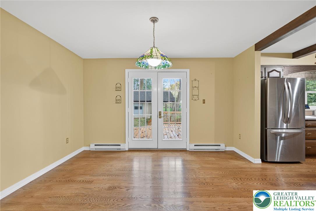 340 Chestnut Hill Road Emmaus, PA 18049 - Photo 26 of 49 wooden floor in an empty room with a window