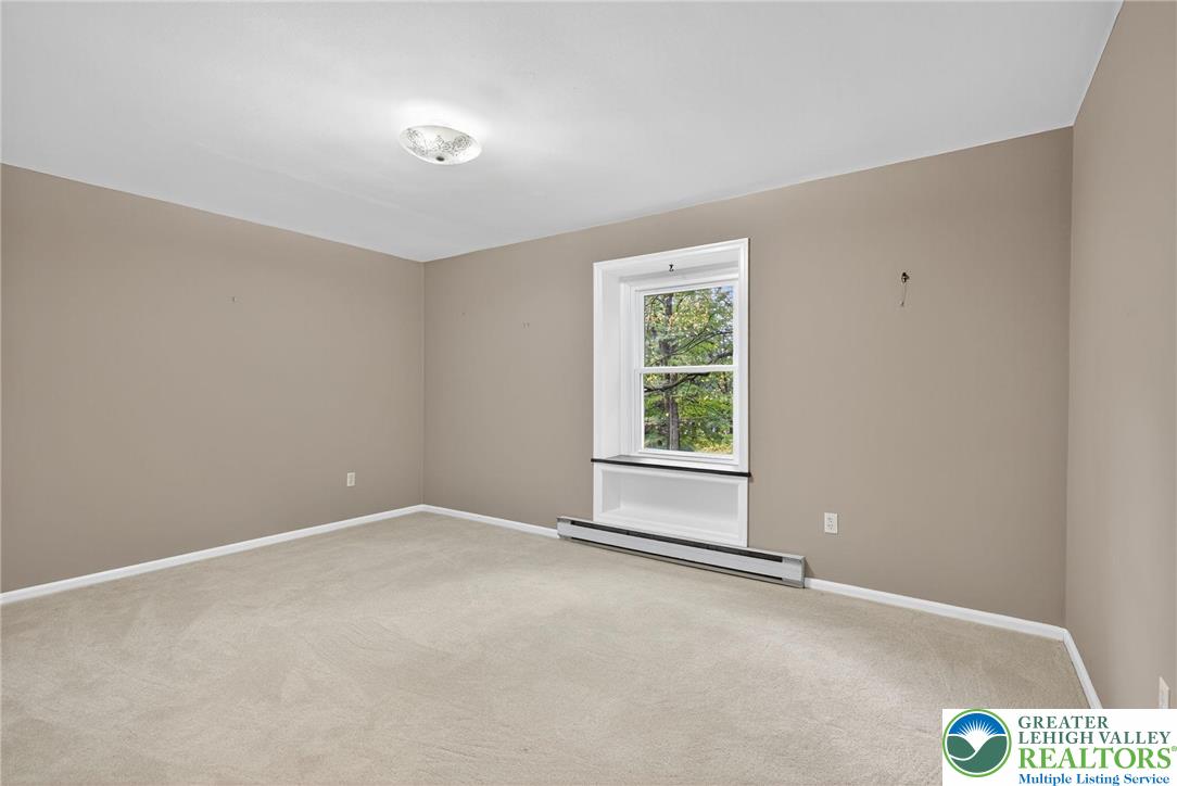 340 Chestnut Hill Road Emmaus, PA 18049 - Photo 39 of 49 an empty room with windows