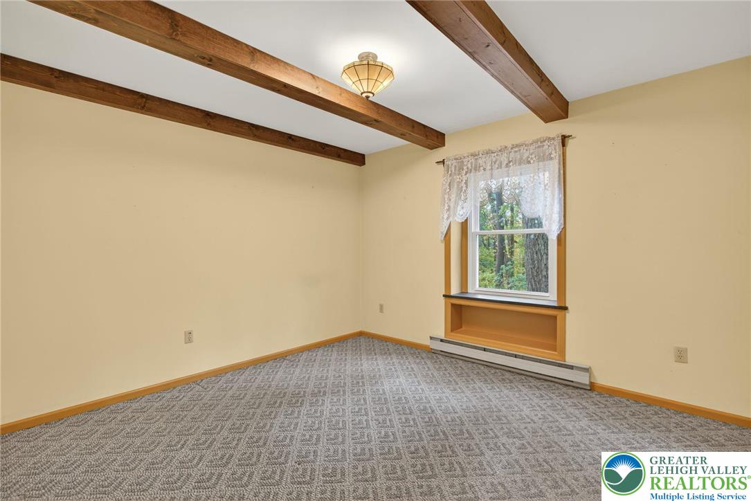 340 Chestnut Hill Road Emmaus, PA 18049 - Photo 40 of 49 a view of an empty room with a window