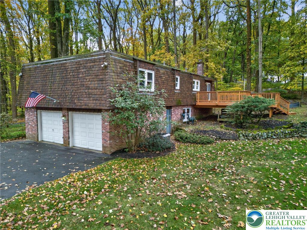 340 Chestnut Hill Road Emmaus, PA 18049 - Photo 4 of 49 a front view of a house with a garden