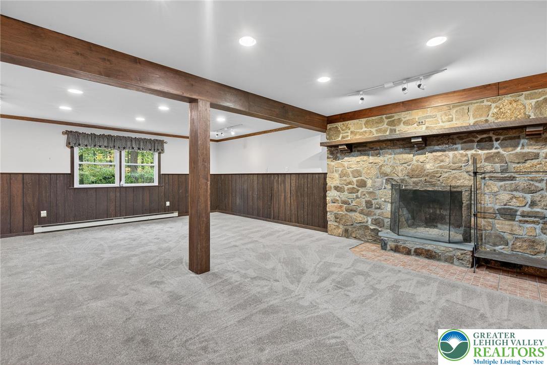 340 Chestnut Hill Road Emmaus, PA 18049 - Photo 42 of 49 a view of an empty room with a fireplace