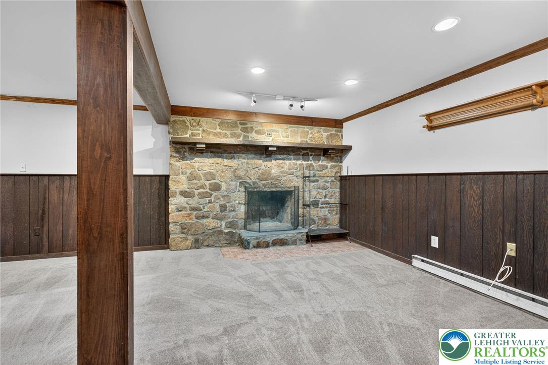 340 Chestnut Hill Road Emmaus, PA 18049 - Photo 43 of 49 a view of an empty room with a fireplace