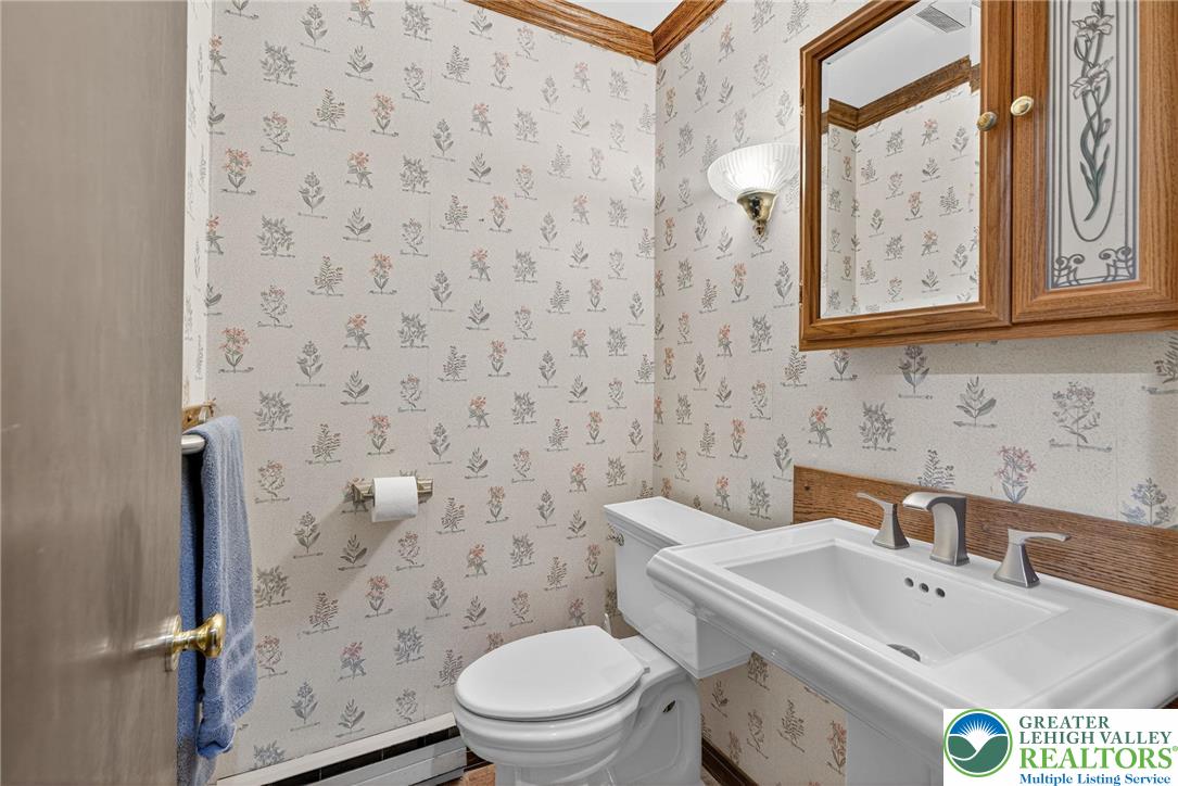 340 Chestnut Hill Road Emmaus, PA 18049 - Photo 47 of 49 a bathroom with a toilet sink and mirror