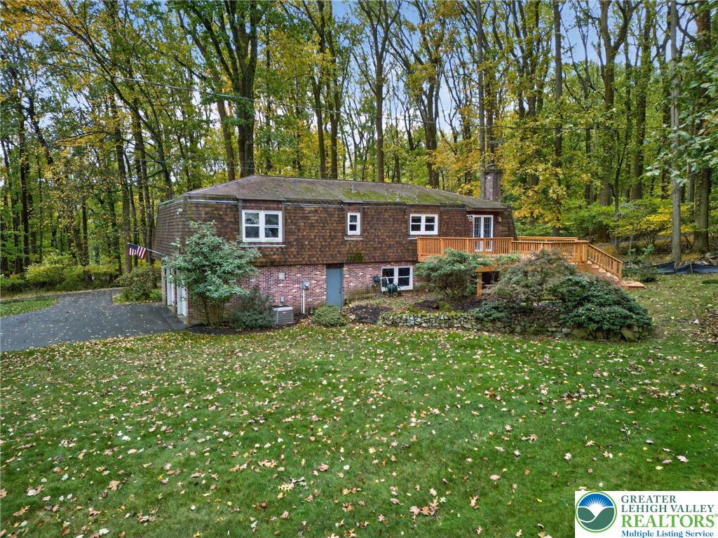 340 Chestnut Hill Road Emmaus, PA 18049 - Photo 5 of 49 a front view of a house with garden