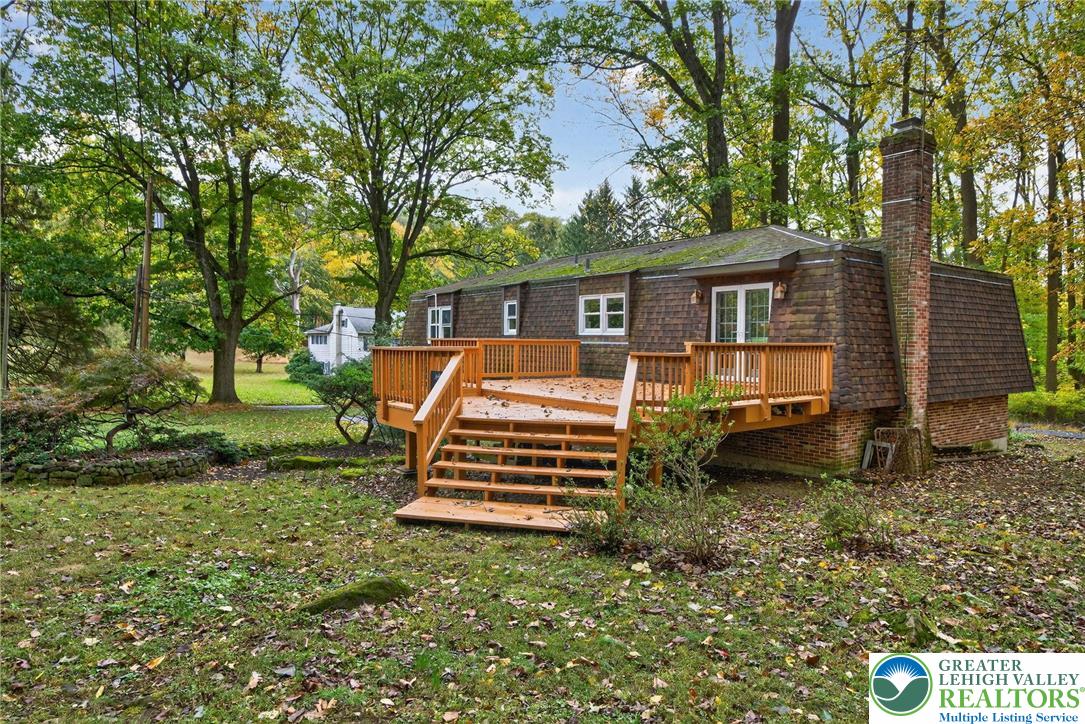 340 Chestnut Hill Road Emmaus, PA 18049 - Photo 7 of 49 front view of a house with a yard