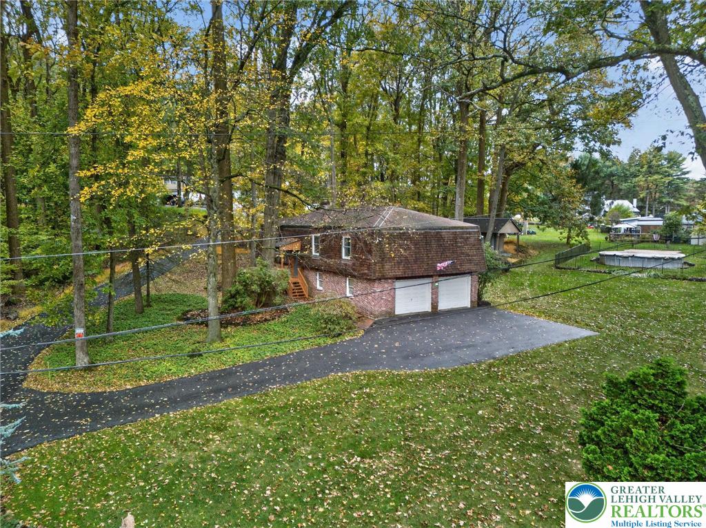 340 Chestnut Hill Road Emmaus, PA 18049 - Photo 9 of 49 a view of a house with a yard