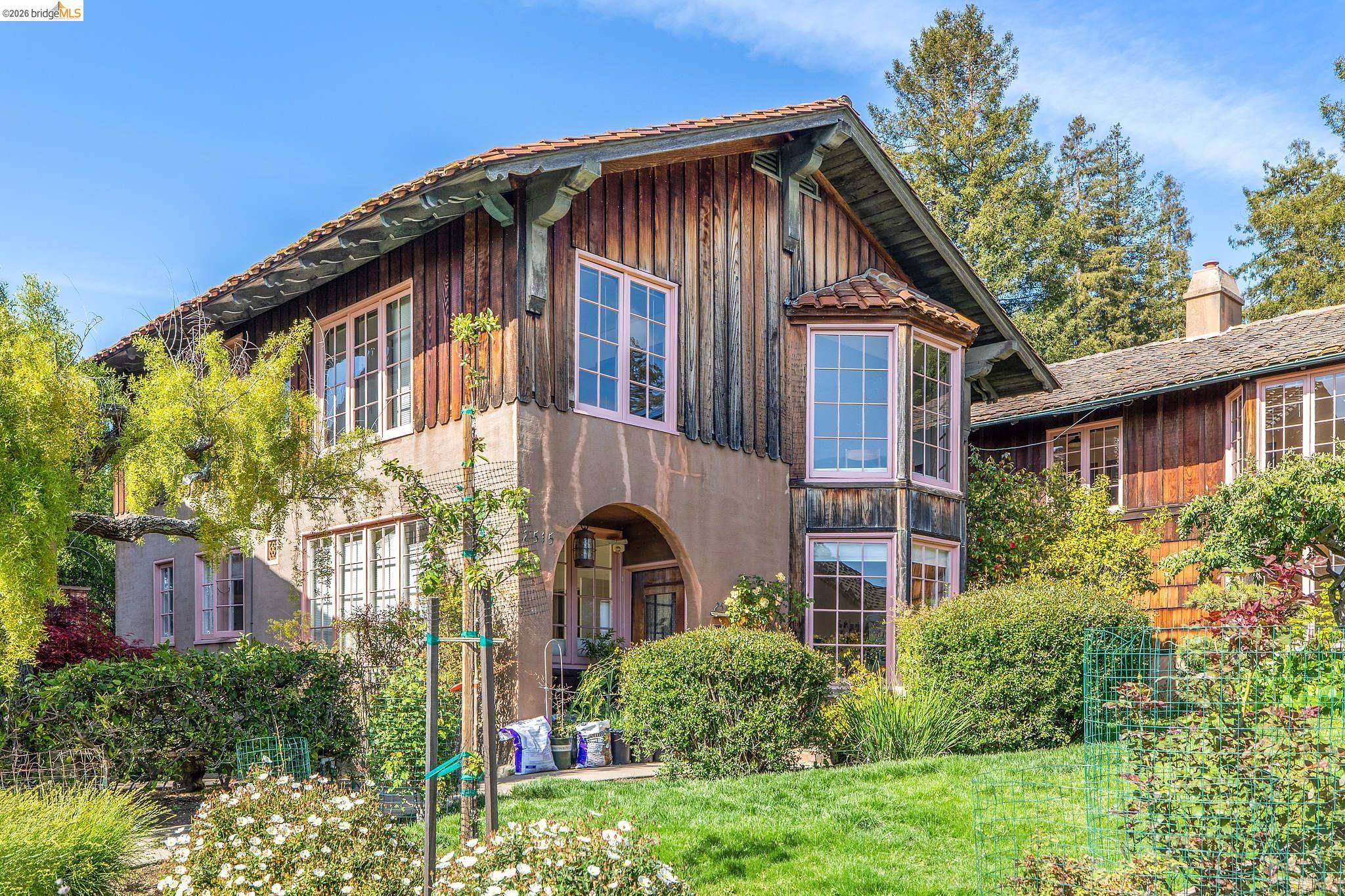 2501 Rose Walk Berkeley, CA 94708 - Photo 12 of 60 a front view of a house with a garden