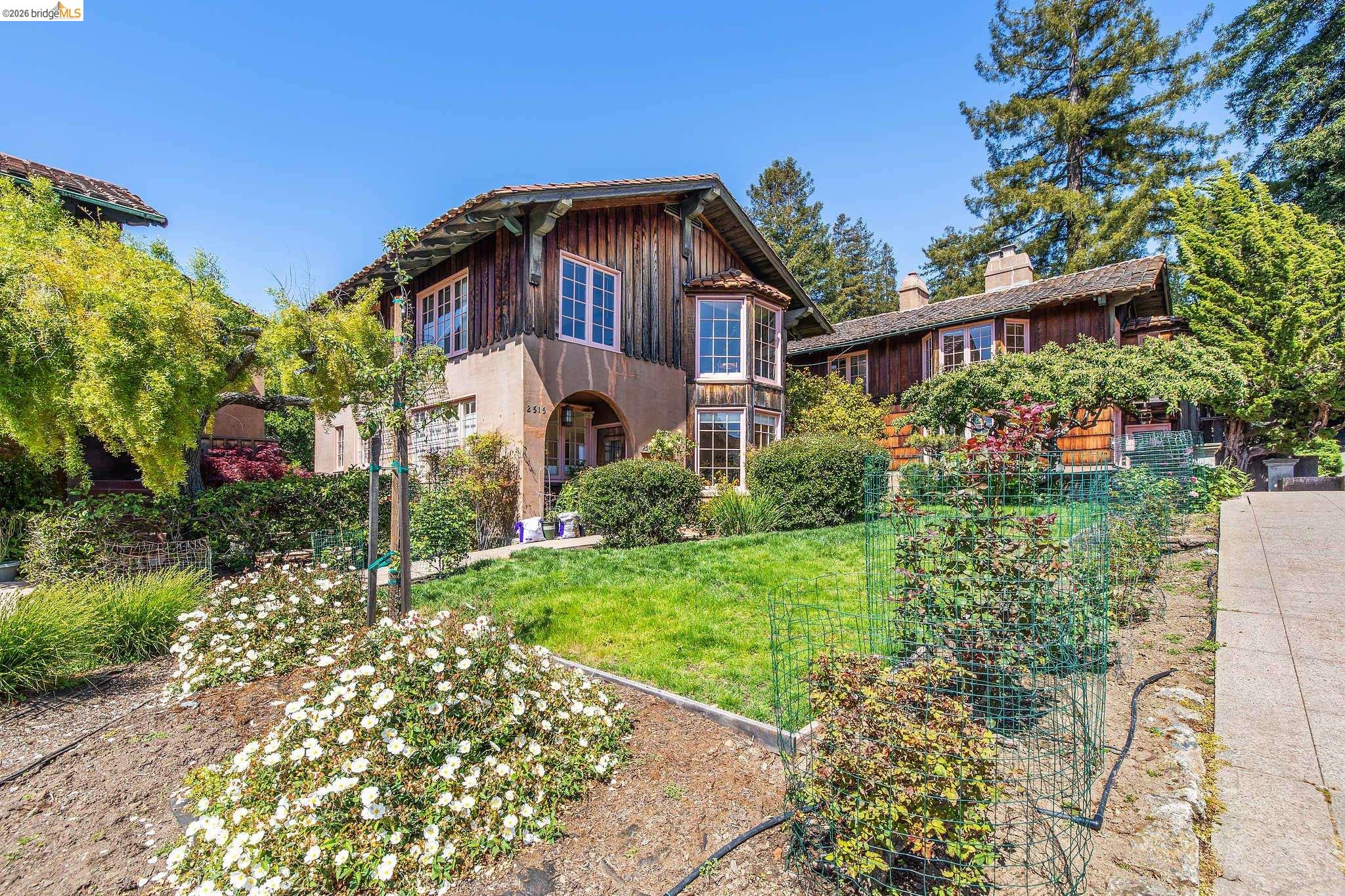 2501 Rose Walk Berkeley, CA 94708 - Photo 15 of 60 a front view of a house with a yard