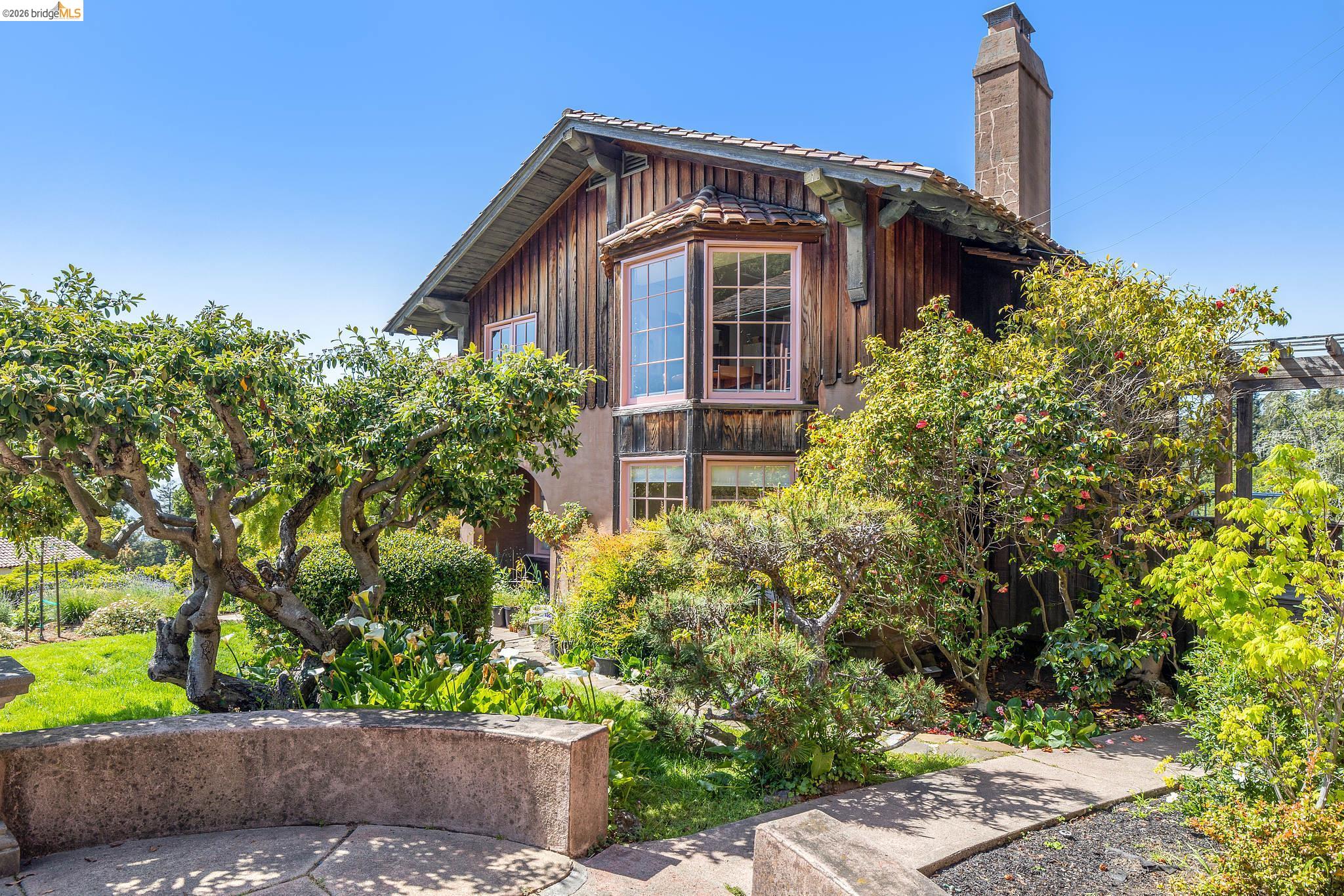 2501 Rose Walk Berkeley, CA 94708 - Photo 17 of 60 a front view of a house with a yard