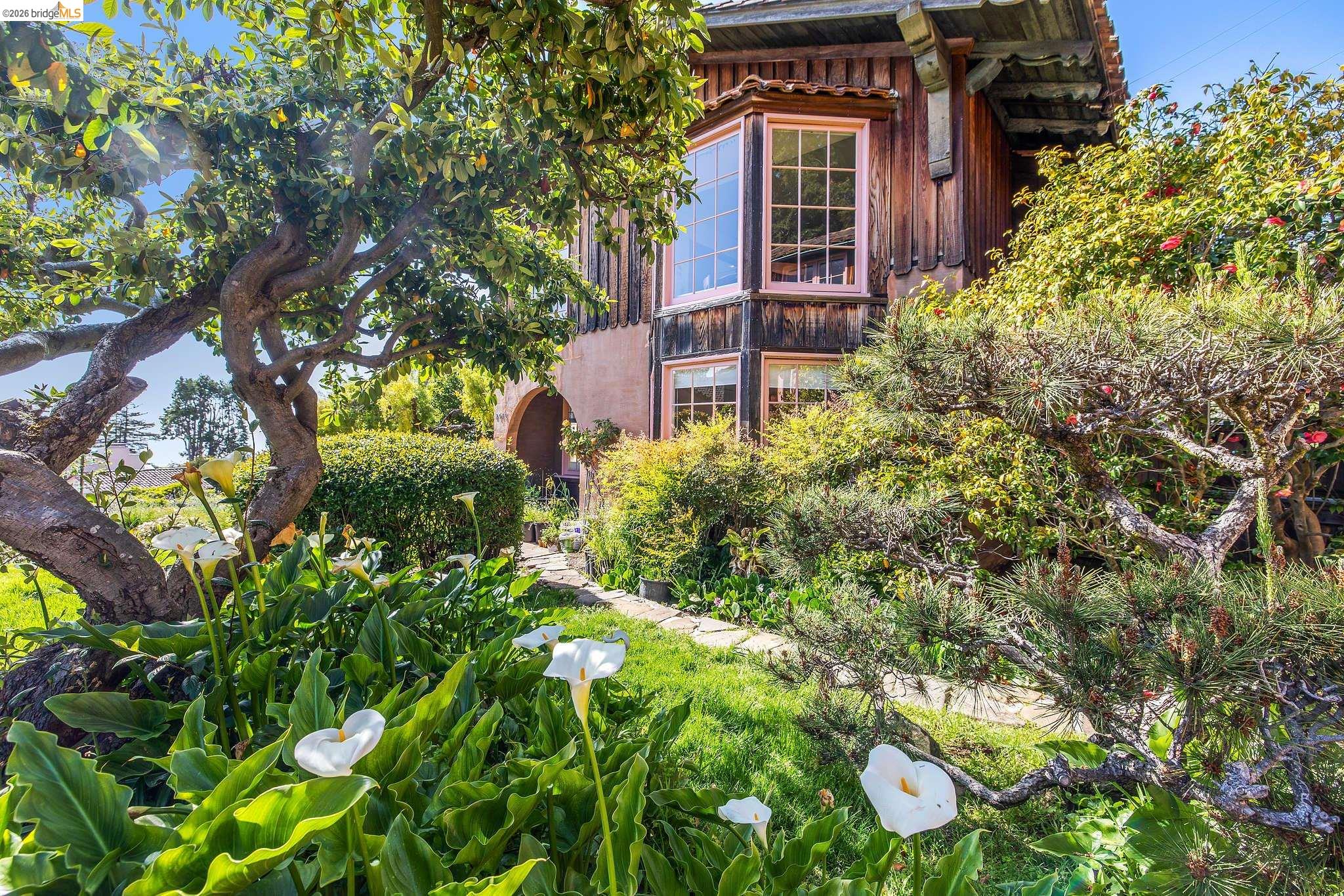 2501 Rose Walk Berkeley, CA 94708 - Photo 19 of 60 a view of a house with a flower garden