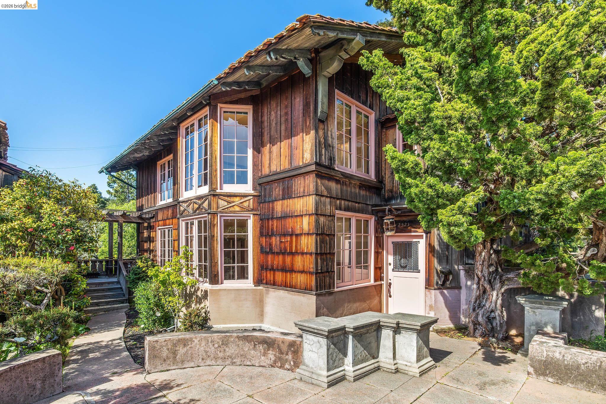2501 Rose Walk Berkeley, CA 94708 - Photo 27 of 60 a front view of a house with a garden