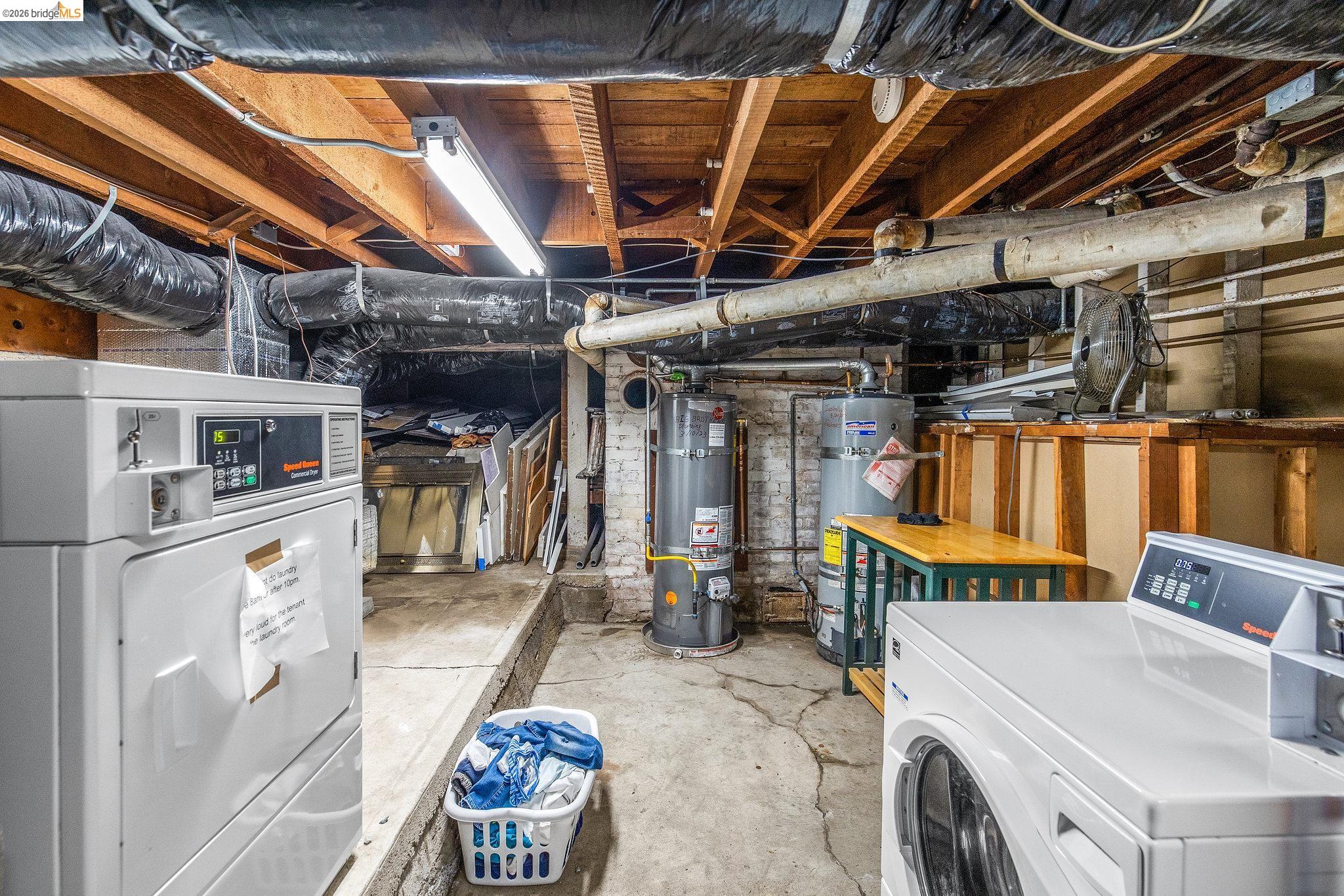 2501 Rose Walk Berkeley, CA 94708 - Photo 30 of 60 a utility room with dryer and washer