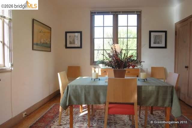 2501 Rose Walk Berkeley, CA 94708 - Photo 33 of 60 a view of a dining room with furniture and a potted plant