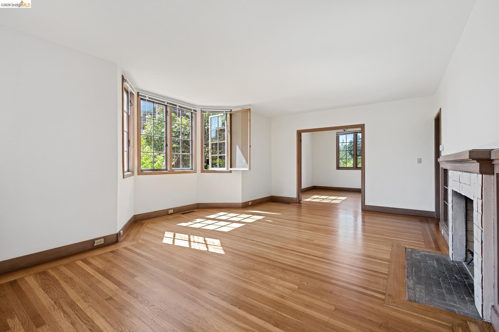 2501 Rose Walk Berkeley, CA 94708 - Photo 35 of 60 a view of empty room with wooden floor and fan